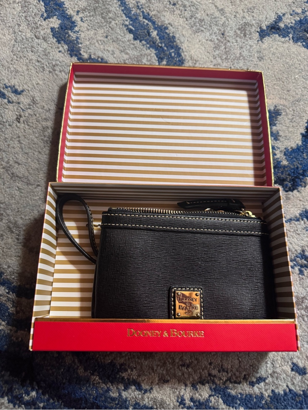 Dooney & Bourke Black Wristlet with Gold Logo Plaque